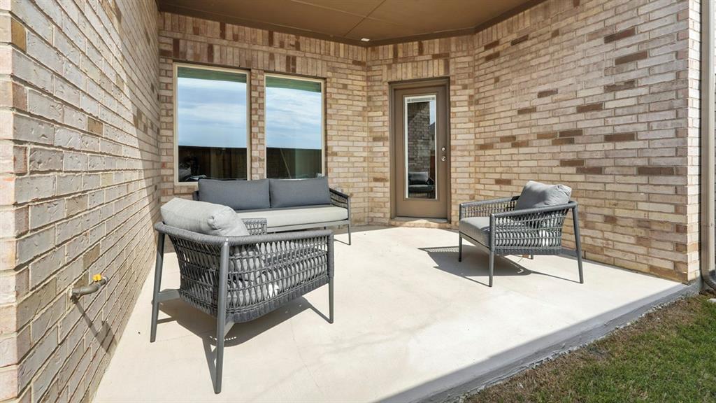 2640 Gladewater Road Celina, TX 75009 - Photo 39 of 40 a building outdoor space with patio furniture