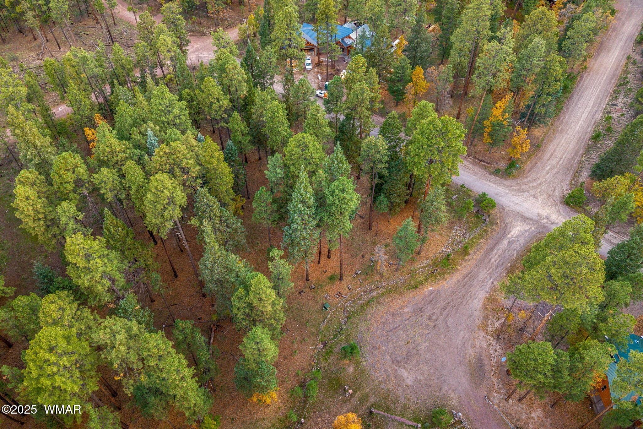 7 2190th Alpine, AZ 85920 - Photo 11 of 16 an aerial view of residential house with outdoor space and trees all around