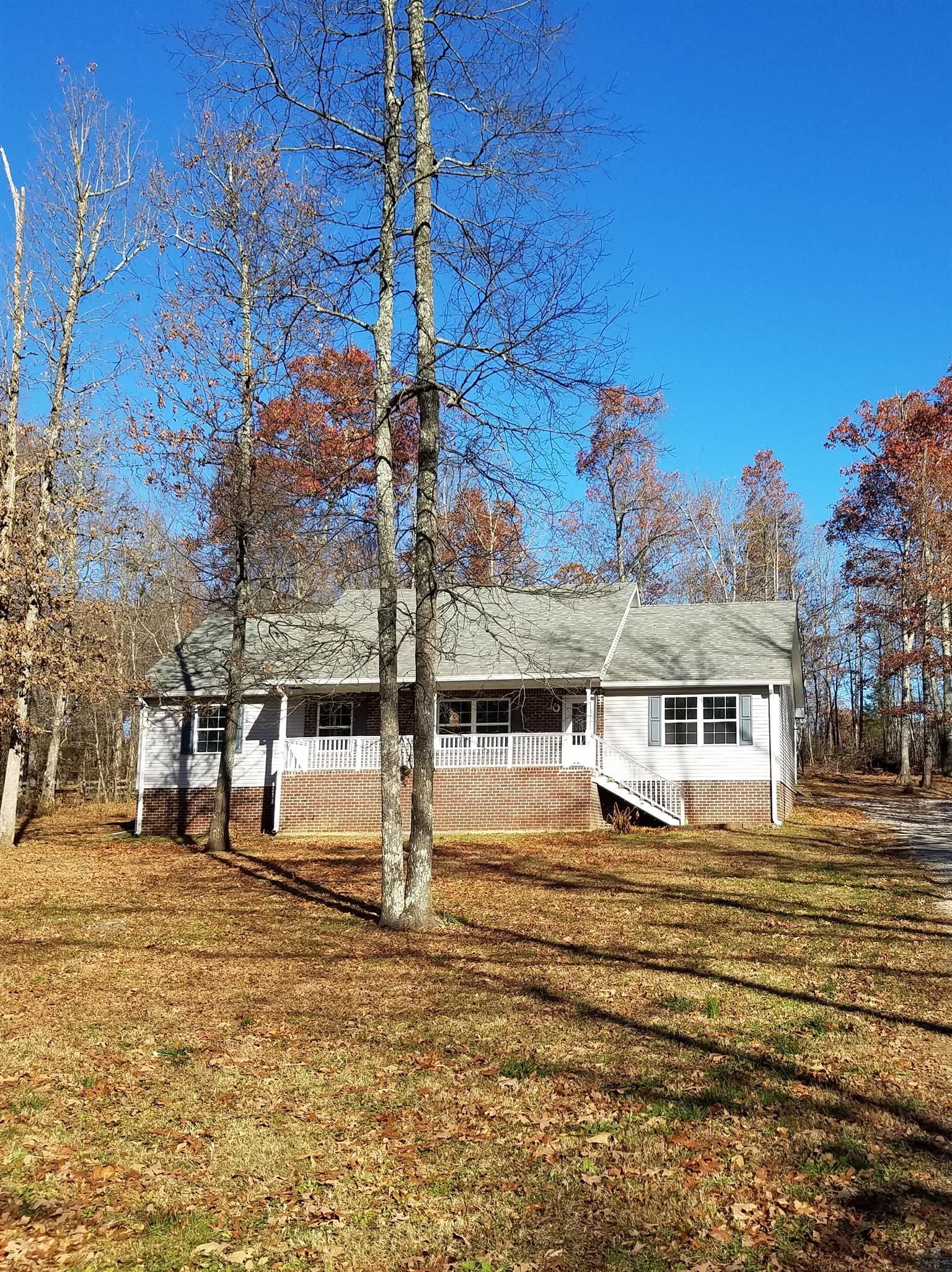 1300 Glendale Road Dickson, TN 37055 - Photo 1 of 30 a view of a house with a yard