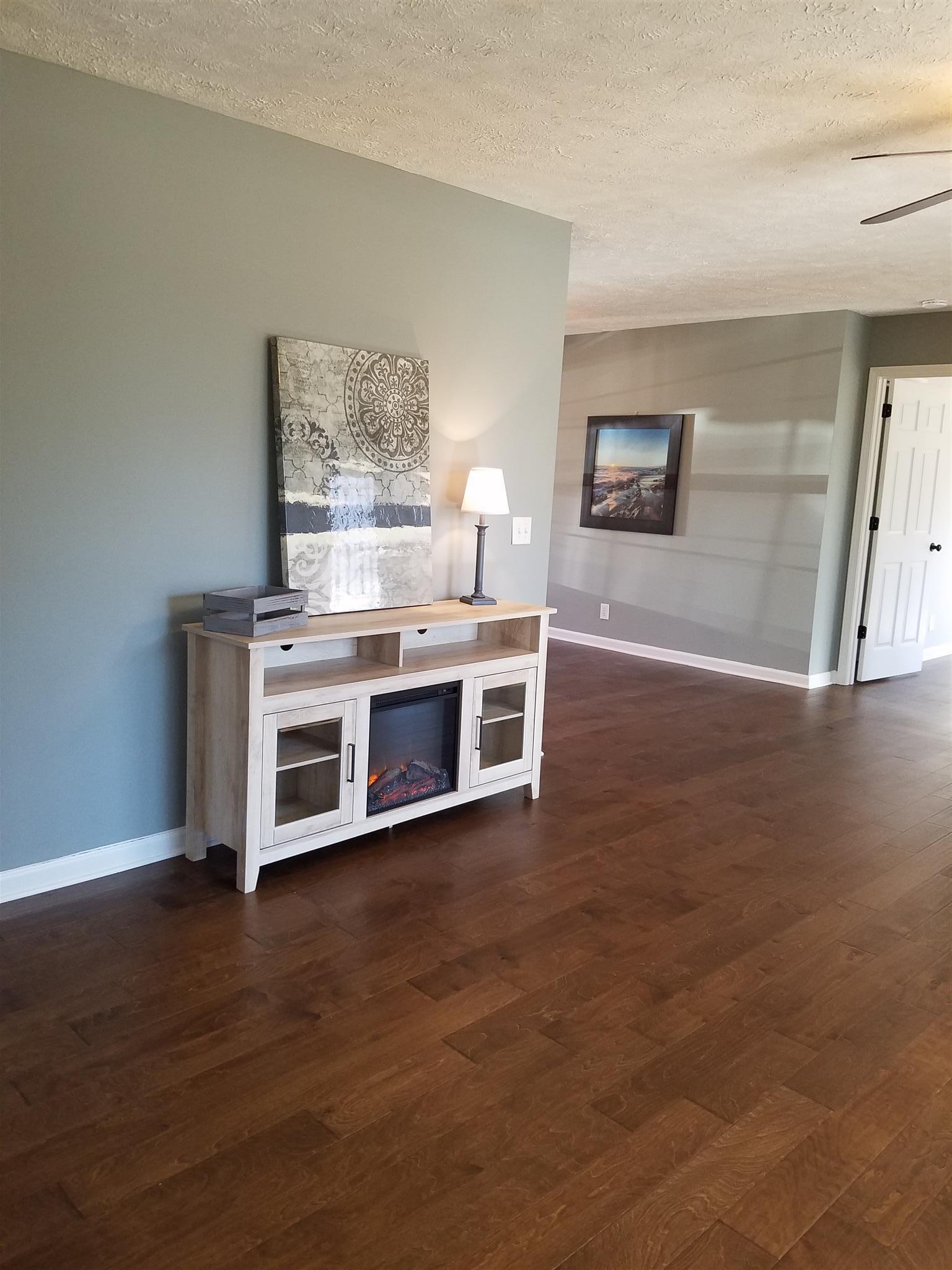 1300 Glendale Road Dickson, TN 37055 - Photo 17 of 30 a view of a room with wooden floor and window