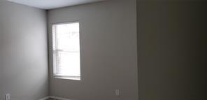9004 Quarry Ridge Trail Fort Worth, TX 76244 - Photo 6 of 11 a view of an empty room and a window