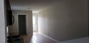 9004 Quarry Ridge Trail Fort Worth, TX 76244 - Photo 8 of 11 a view of a hallway with wooden floor