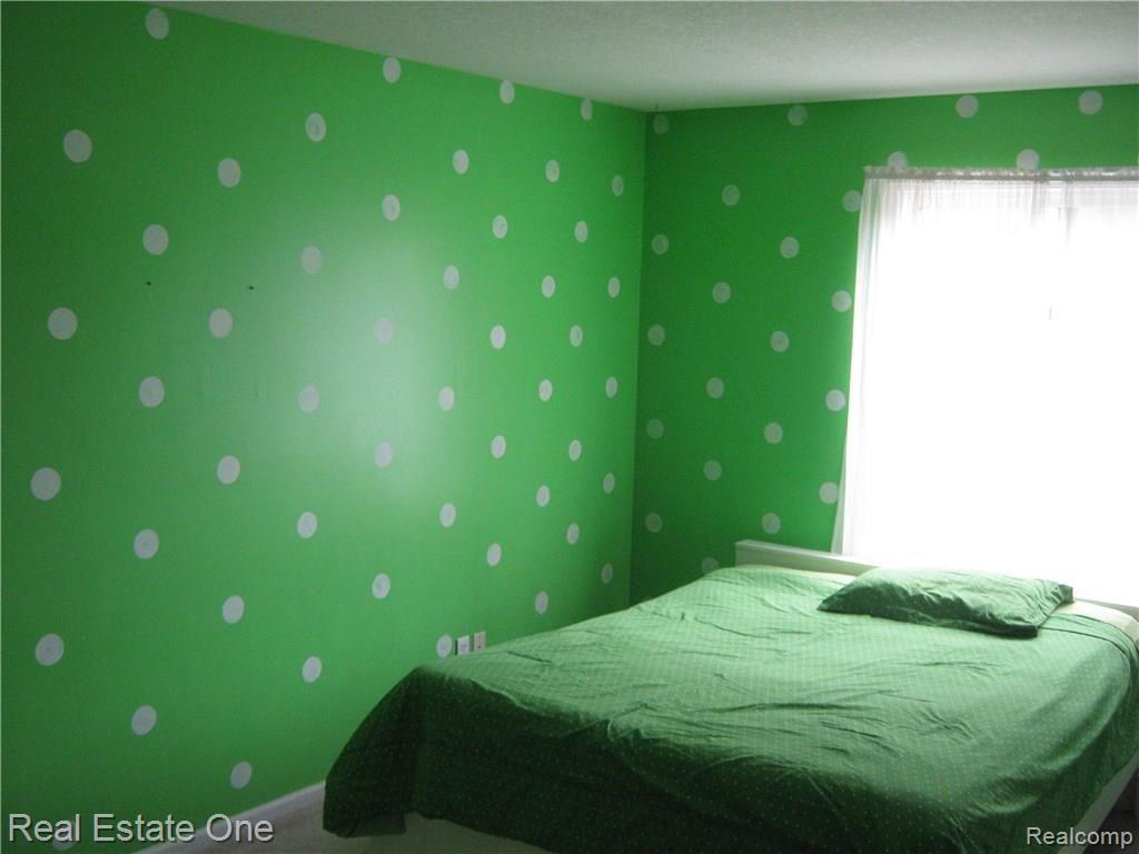 23880 Hall Road Trenton, MI 48183 - Photo 43 of 50 Another large bedroom - bed stays if needed
