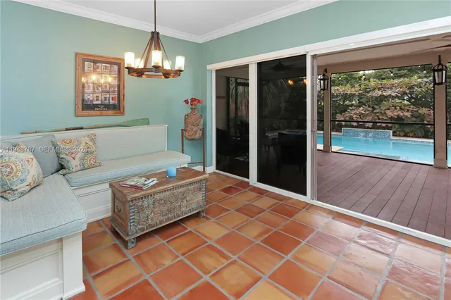 a bedroom with a bed dresser and a window