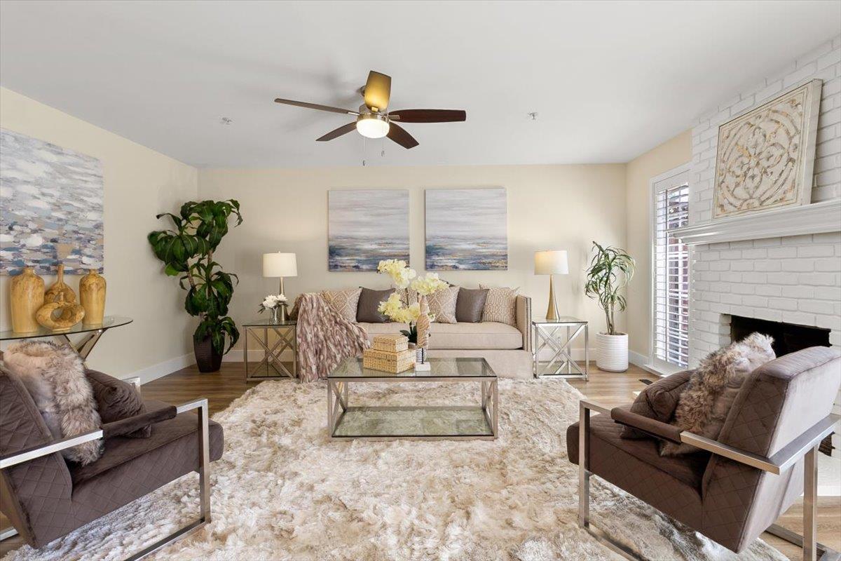 654 North San Antonio Road Los Altos, CA 94022 - Photo 11 of 28 a living room with furniture and a fireplace