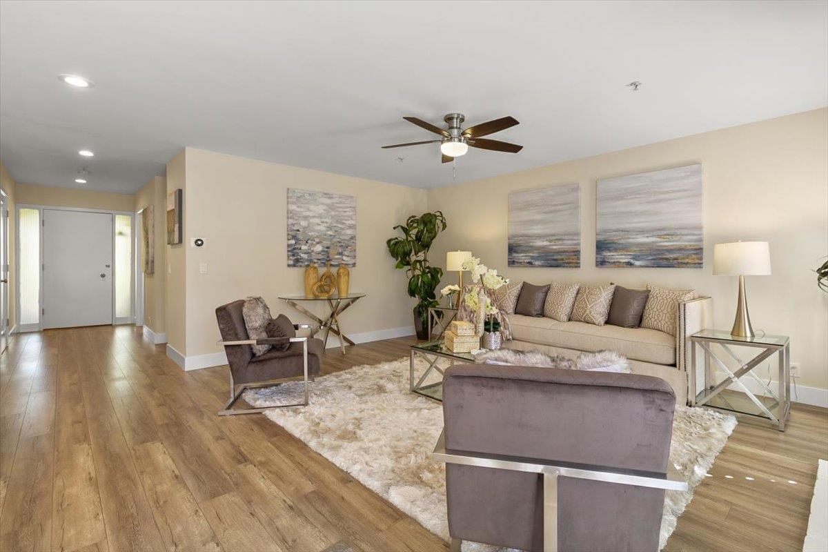 654 North San Antonio Road Los Altos, CA 94022 - Photo 12 of 28 a living room with furniture and a wooden floor