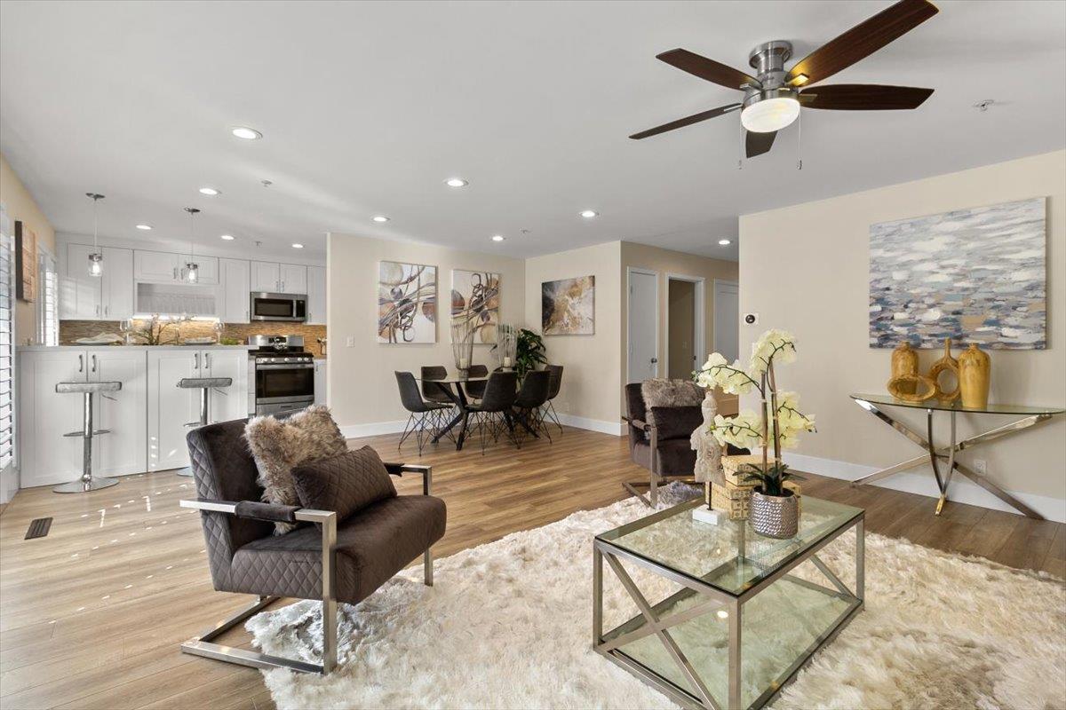 654 North San Antonio Road Los Altos, CA 94022 - Photo 14 of 28 a living room with furniture and kitchen view