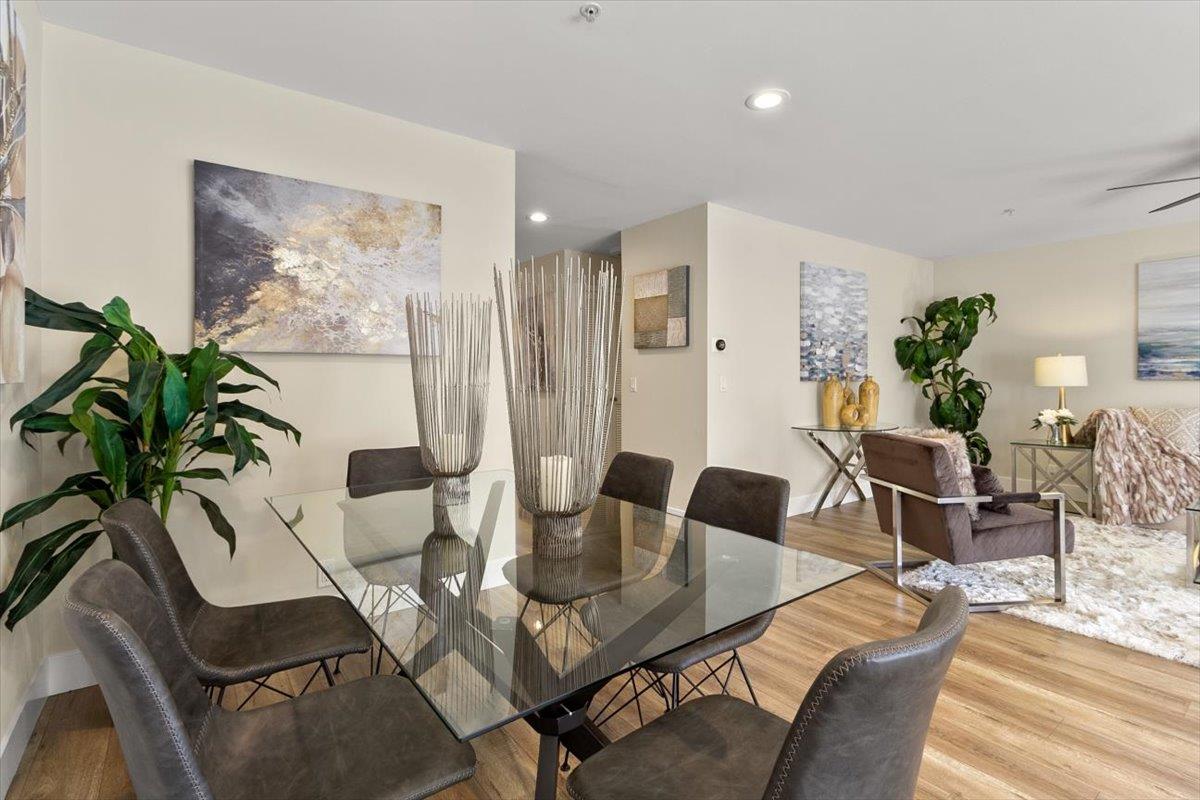 654 North San Antonio Road Los Altos, CA 94022 - Photo 19 of 28 a view of a dining room with furniture window and wooden floor