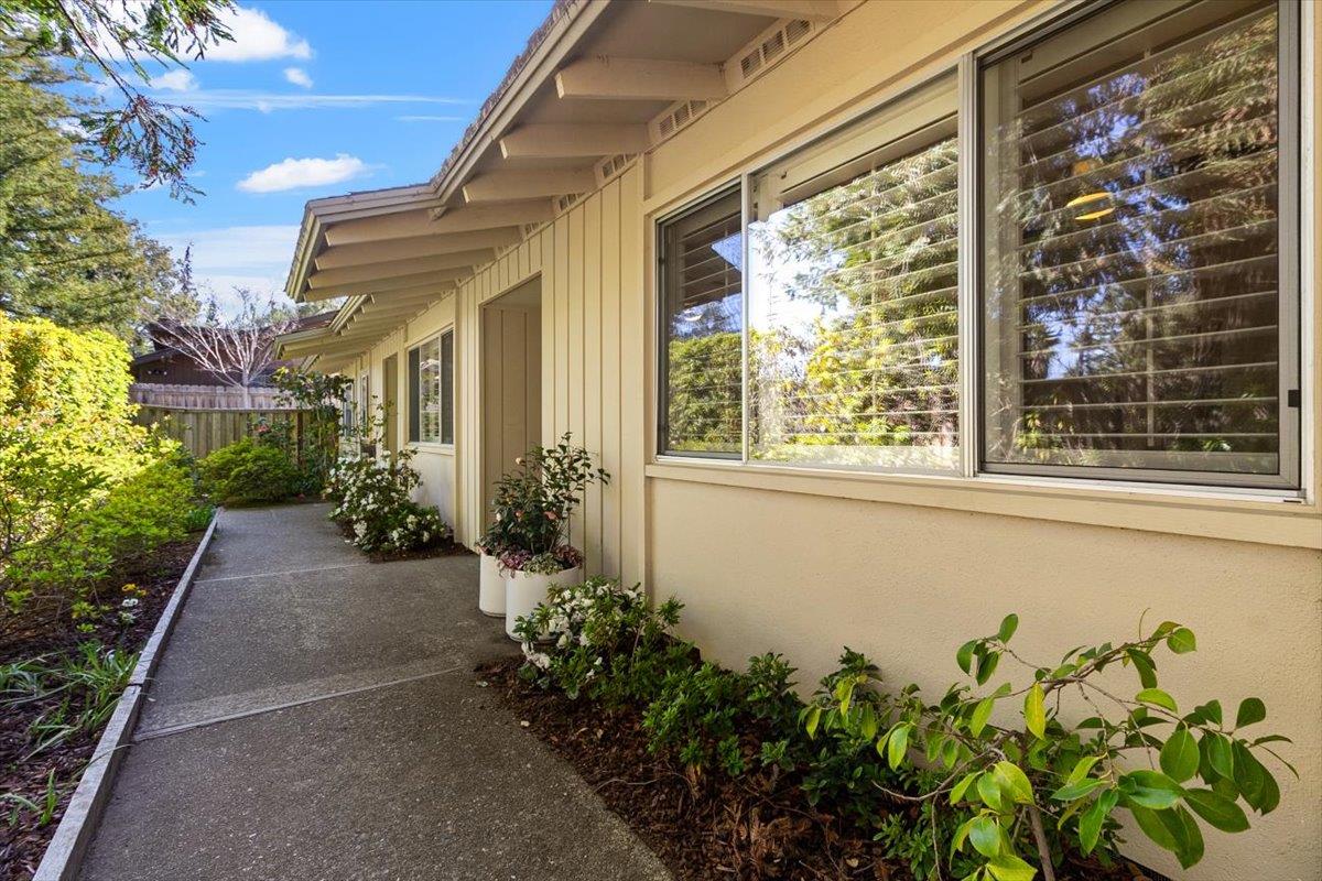 654 North San Antonio Road Los Altos, CA 94022 - Photo 2 of 28 a view of a pathway with a flower pot