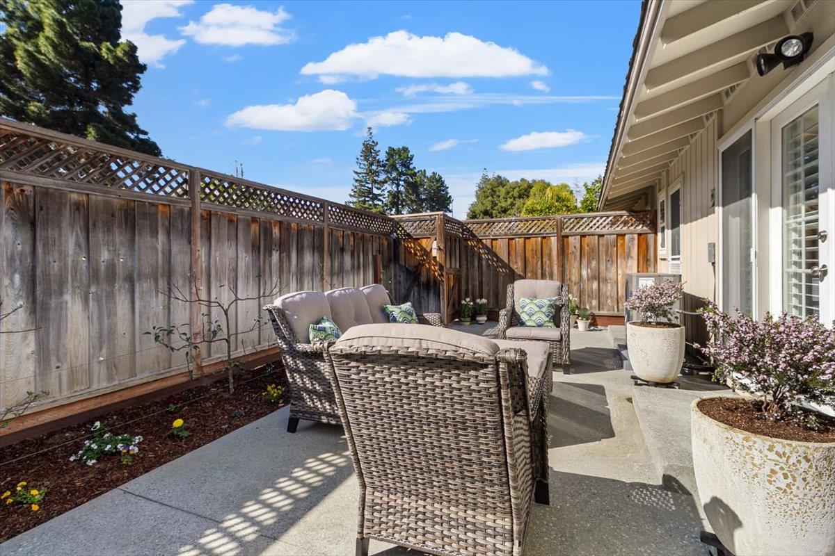 654 North San Antonio Road Los Altos, CA 94022 - Photo 26 of 28 a view of a patio with couches and potted plants
