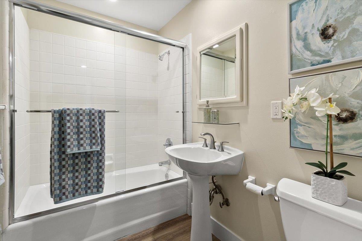 654 North San Antonio Road Los Altos, CA 94022 - Photo 6 of 28 a bathroom with a sink a toilet and shower