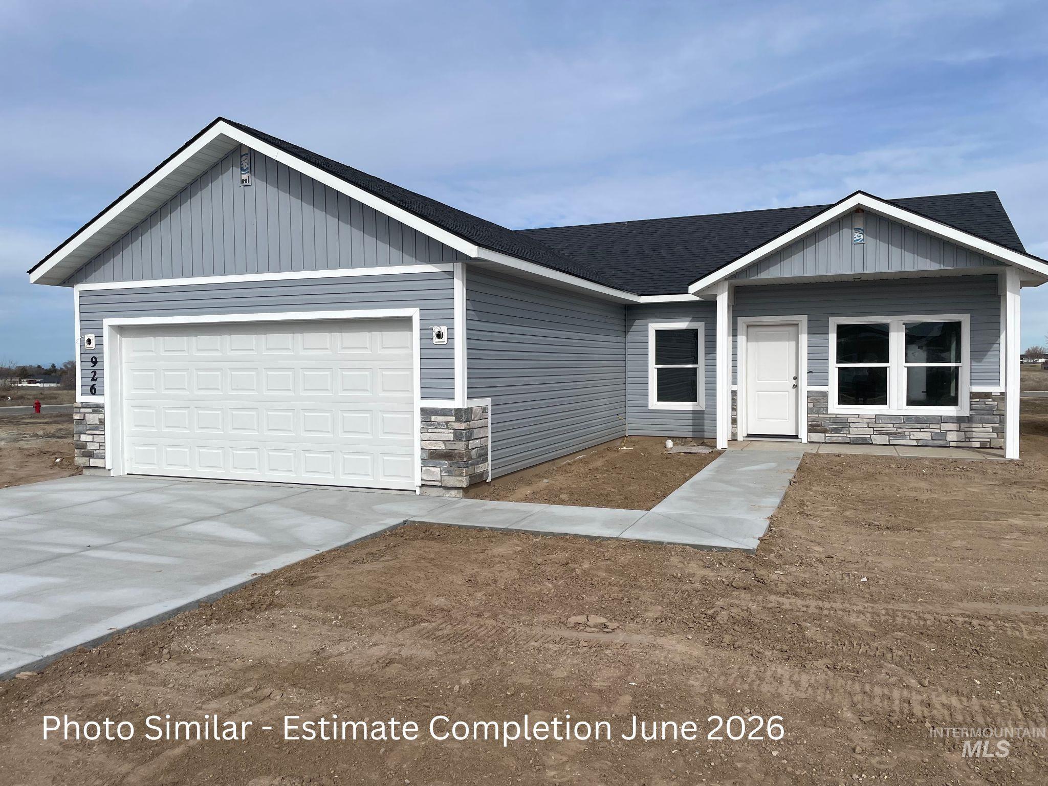 Ranch-style home with stone siding, an attached garage, concrete driveway, and roof with shingles