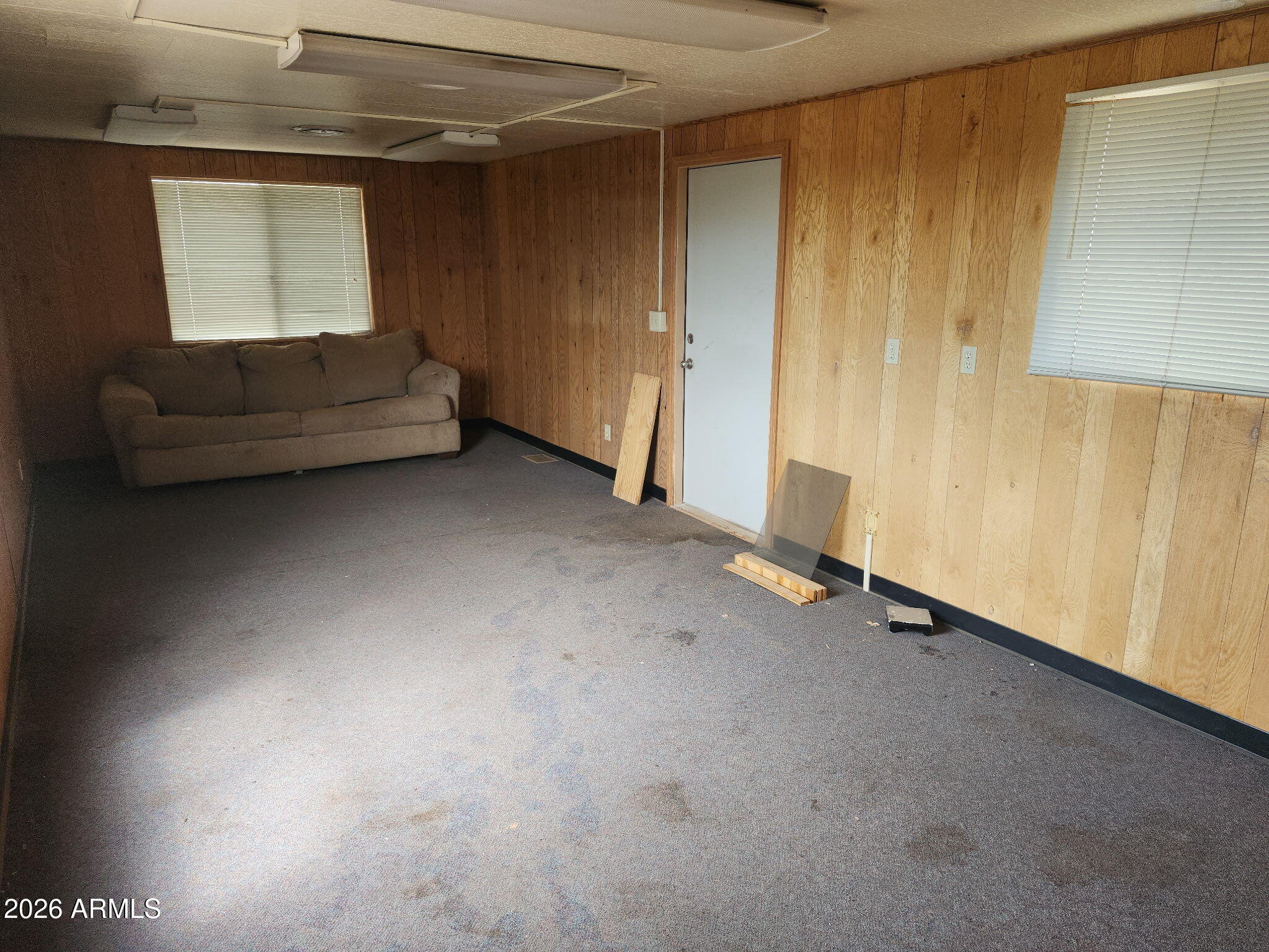 8602 Fox Place Show Low, AZ 85901 - Photo 16 of 20 a view of room with stairs and a window