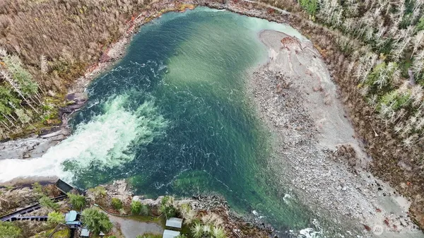 a view of a lake with a yard