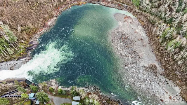 a view of a lake with a yard