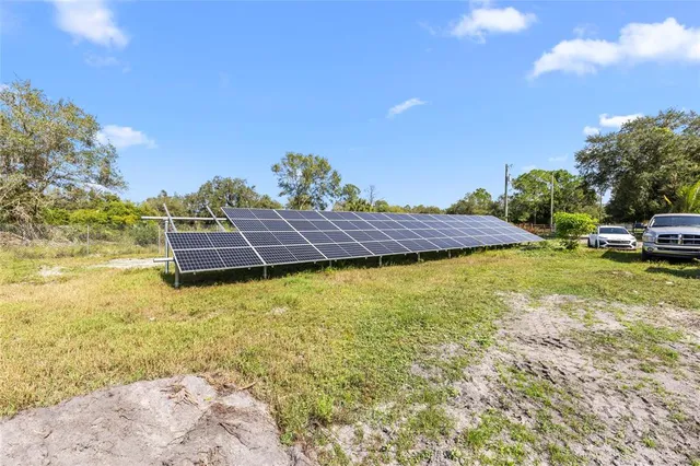 a view of a water fountain in front of a house