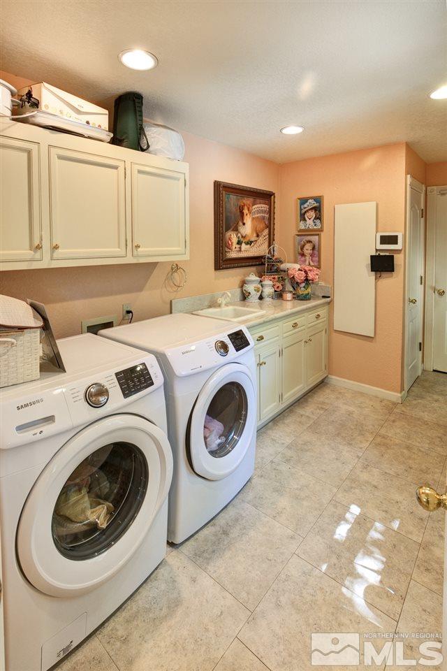 5721 Rivers Edge Drive Fallon, NV 89406 - Photo 12 of 17 a utility room with sink dryer and washer