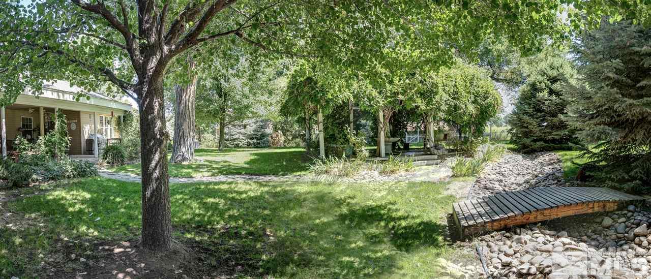 5721 Rivers Edge Drive Fallon, NV 89406 - Photo 13 of 17 a view of backyard with green space