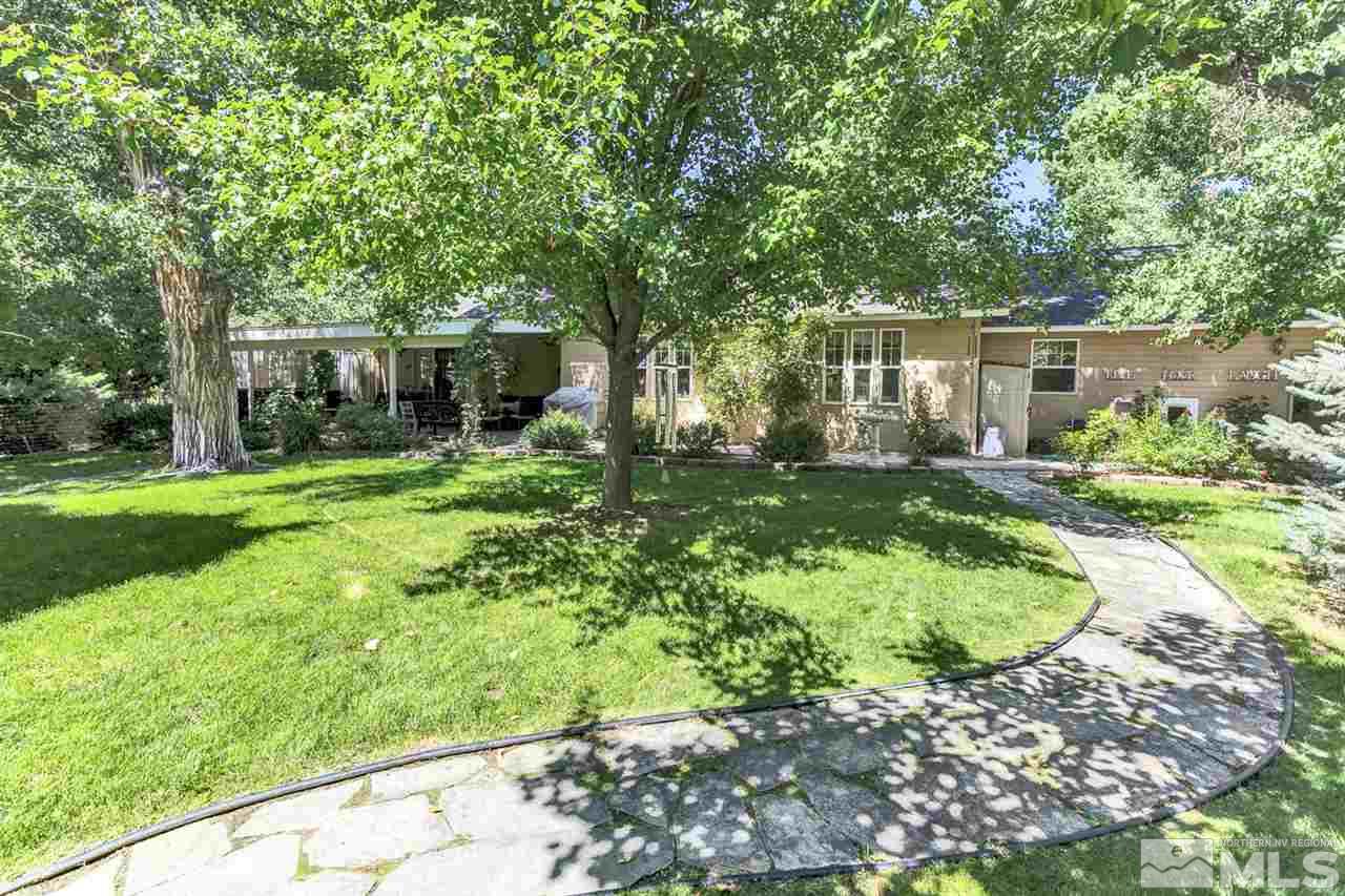 5721 Rivers Edge Drive Fallon, NV 89406 - Photo 16 of 17 a front view of a house with a yard