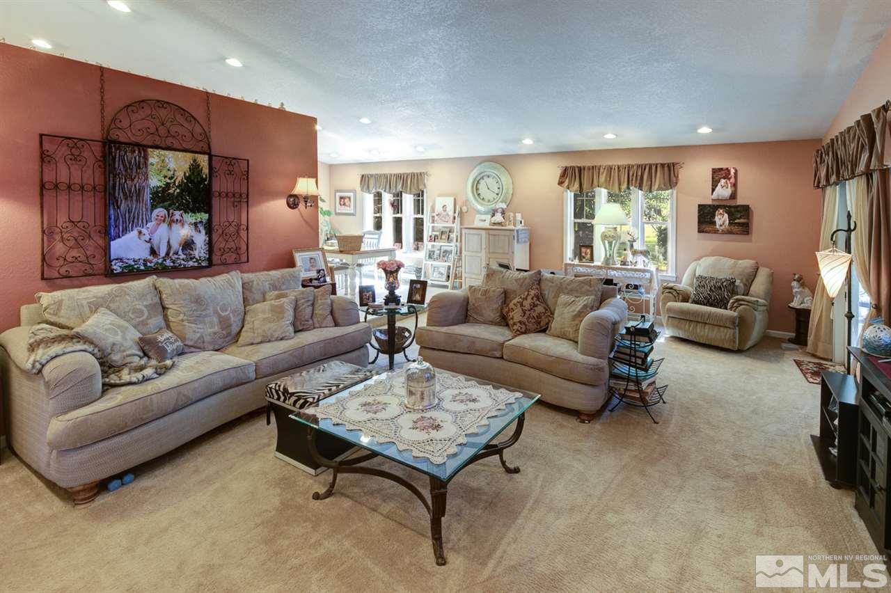 5721 Rivers Edge Drive Fallon, NV 89406 - Photo 2 of 17 a living room with furniture and a large window