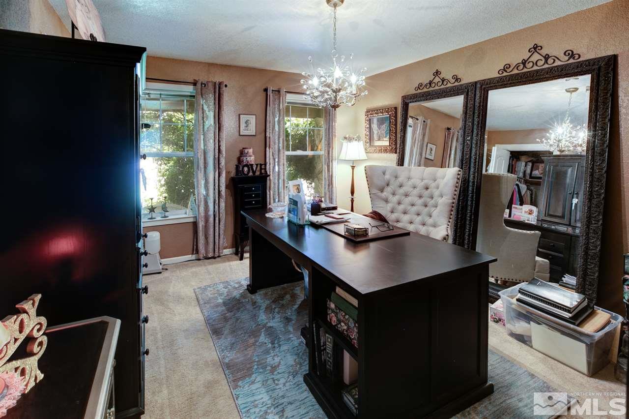 5721 Rivers Edge Drive Fallon, NV 89406 - Photo 7 of 17 a kitchen with sink cabinets and window