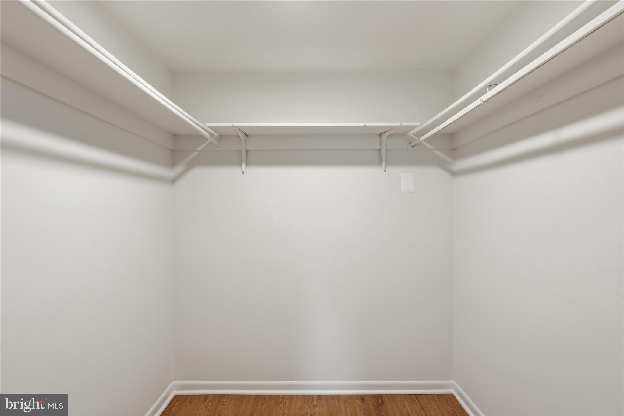 1540 Northgate Square, Unit 21B Reston, VA 20190 - Photo 16 of 24 a view of a room with racks on the wall