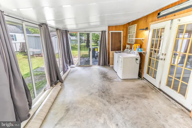 a view of a room with a large window