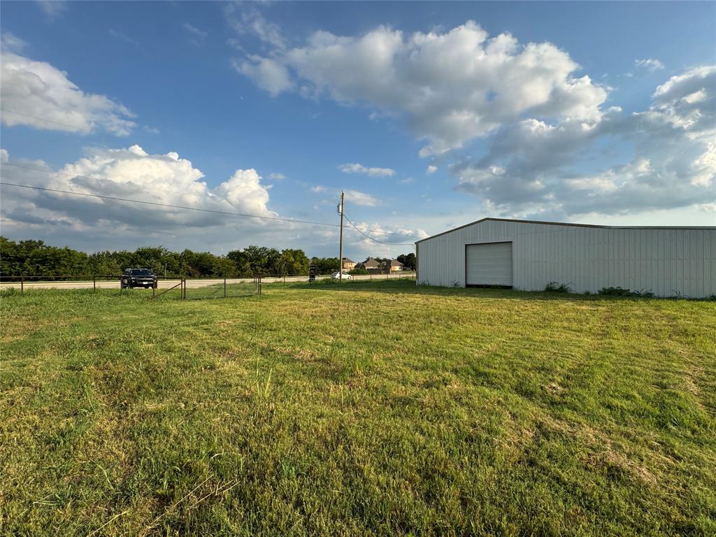 13625 Reeder Road Forney, TX 75126 - Photo 12 of 18 a view of a big room with an outdoor space