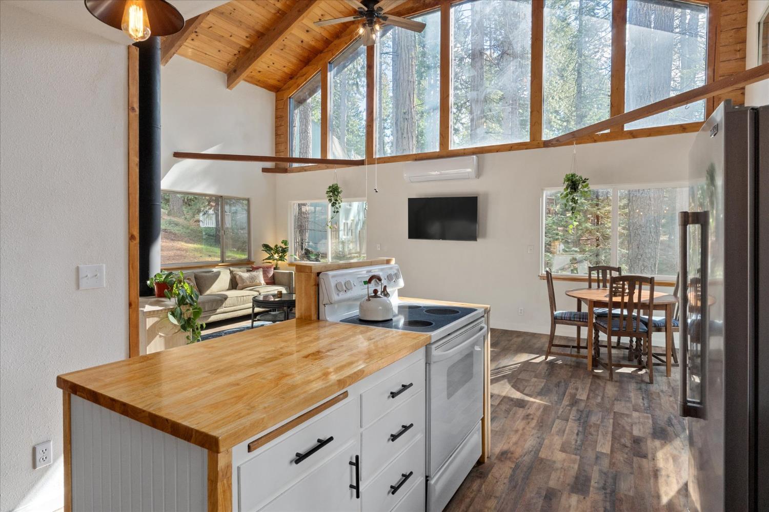 210 David Lee Road Arnold, CA 95223 - Photo 18 of 37 a view of a dining room with furniture window and wooden floor
