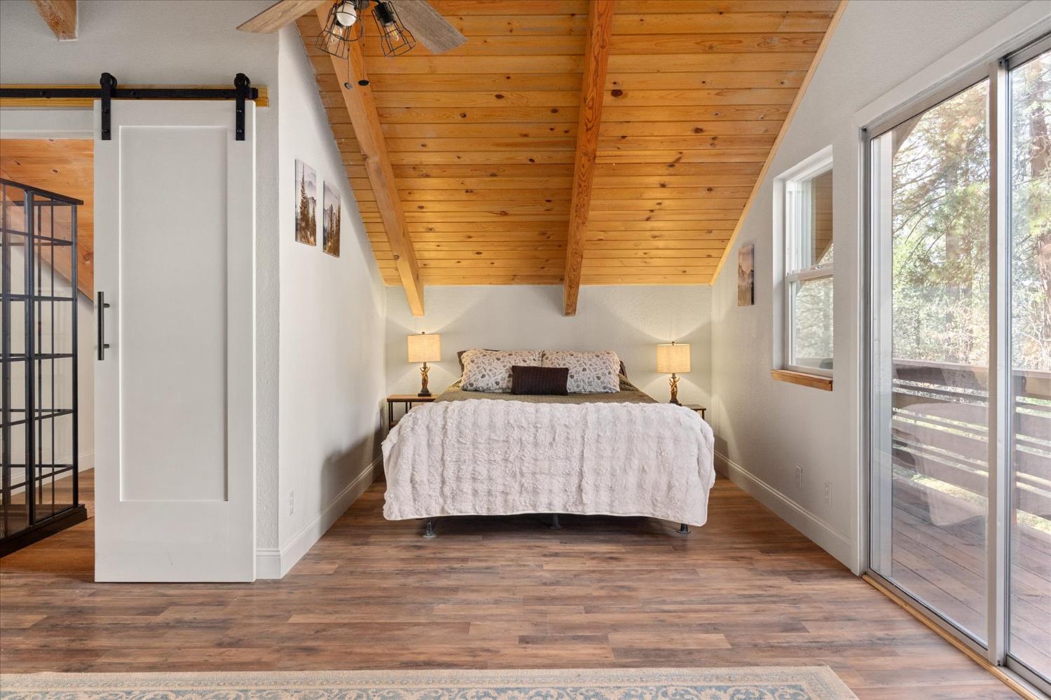 210 David Lee Road Arnold, CA 95223 - Photo 25 of 37 a room with a bed and a window