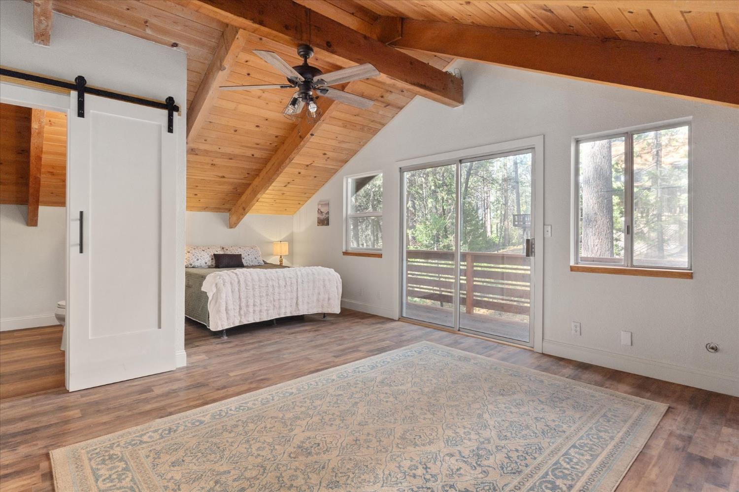 210 David Lee Road Arnold, CA 95223 - Photo 28 of 37 a view of a bedroom with furniture window and a ceiling fan
