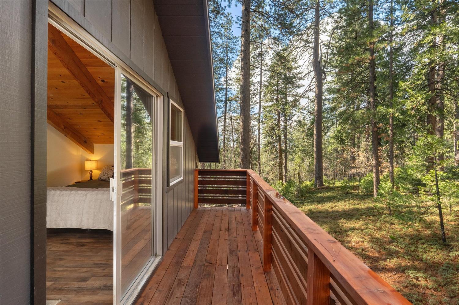 210 David Lee Road Arnold, CA 95223 - Photo 29 of 37 a view of balcony with wooden floor and fence