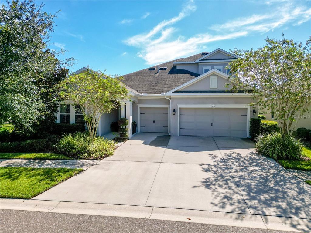 5902 Jade Creek Lane Lithia, FL 33547 - Photo 1 of 56 front view of a house with a garage