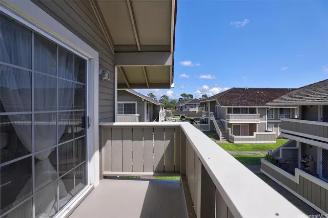a view of house with swimming pool outdoor seating