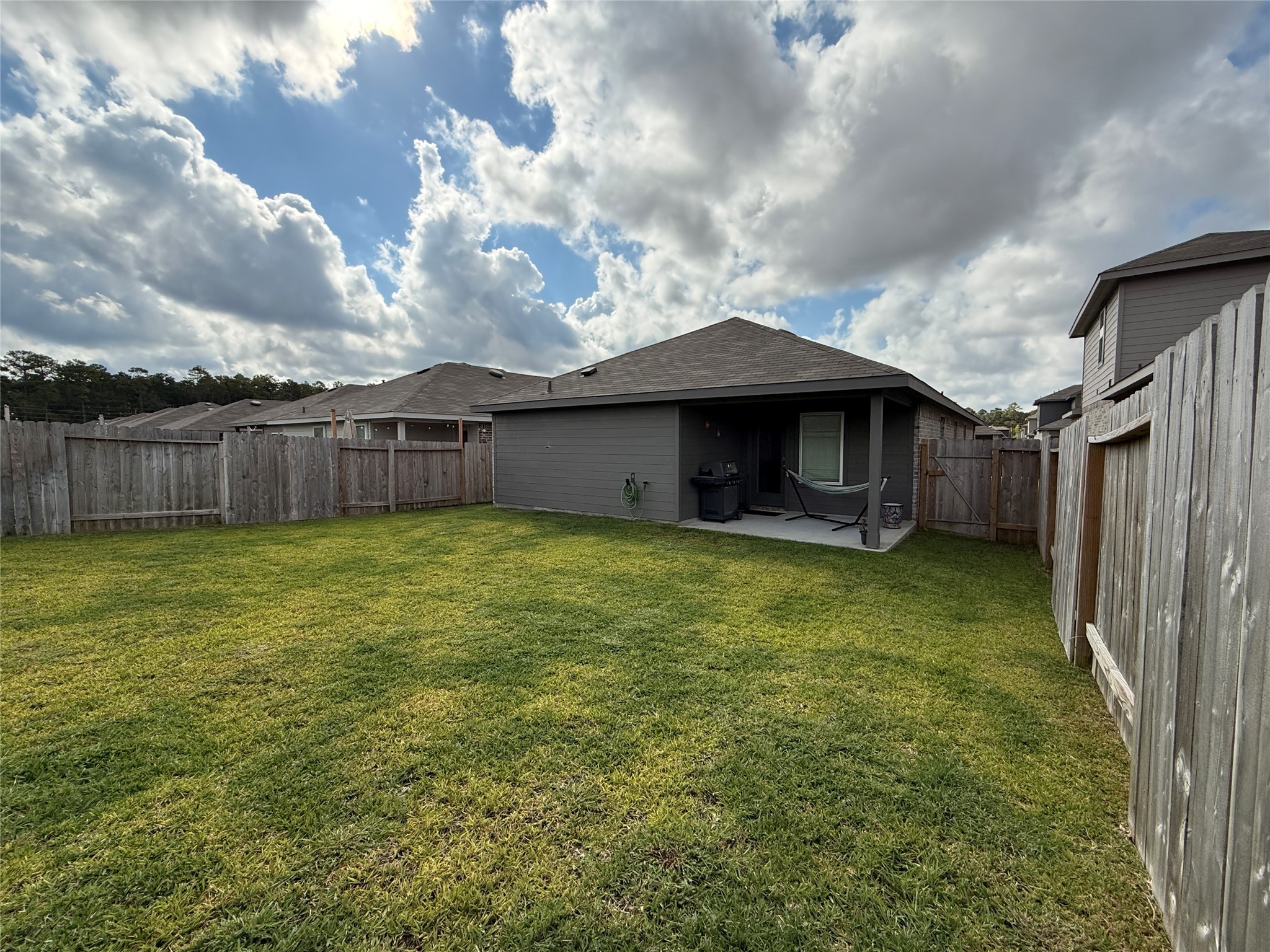 5607 Redstone Gardens Drive Spring, TX 77373 - Photo 13 of 13 a front view of a house with garden