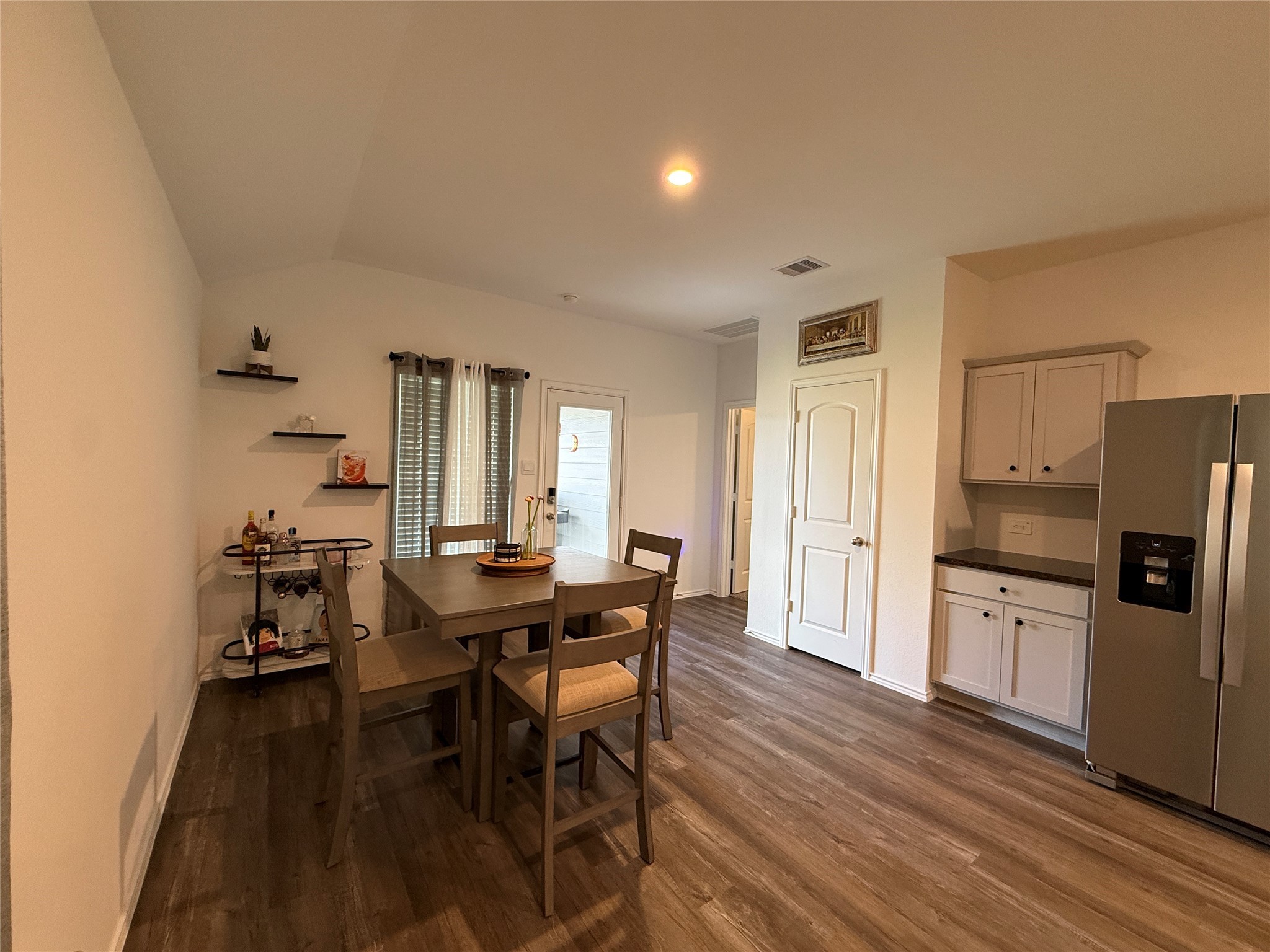 5607 Redstone Gardens Drive Spring, TX 77373 - Photo 5 of 13 a dining room with furniture and wooden floor