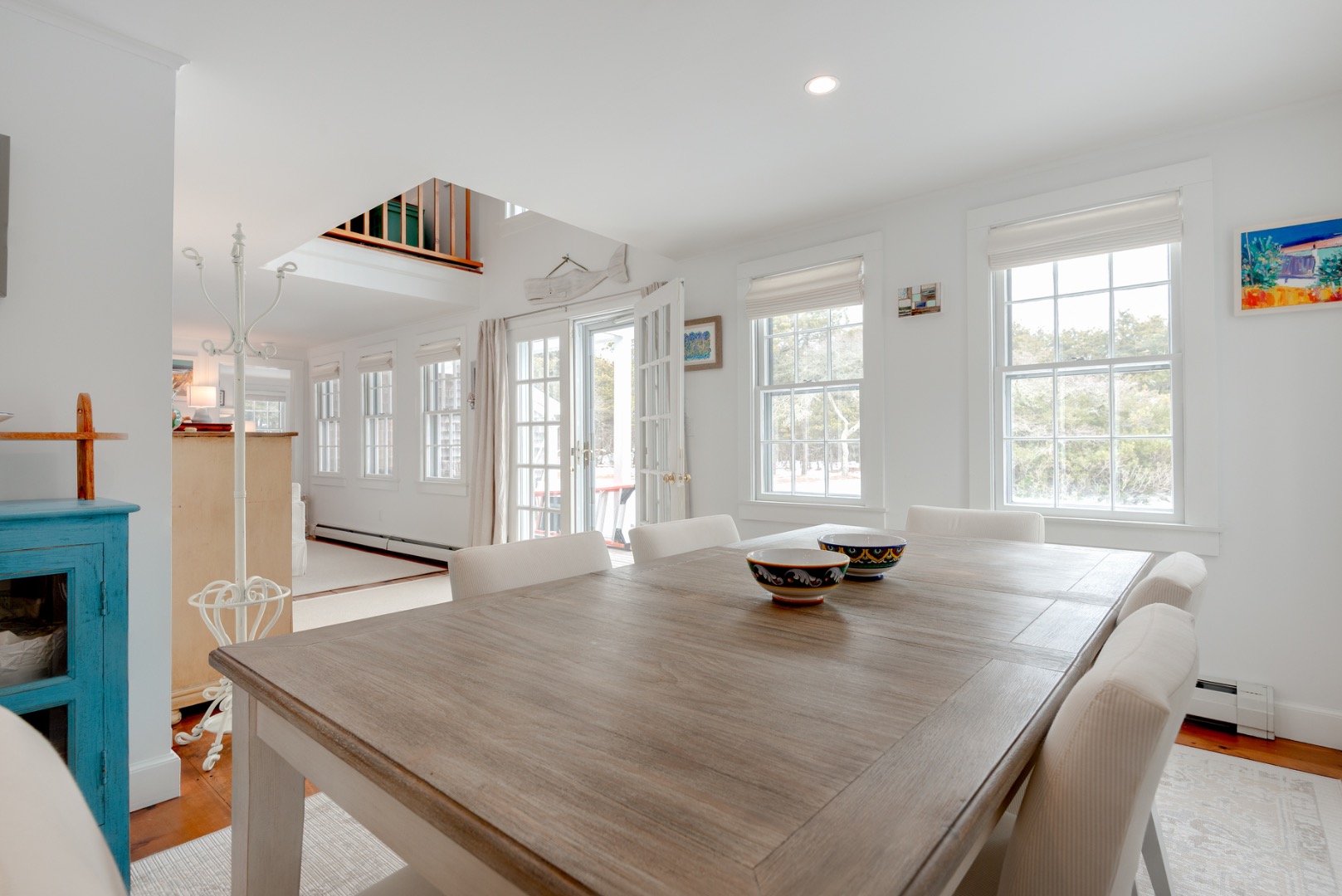 11 Sesapana Road Nantucket, MA 02554 - Photo 12 of 37 a dining room with a table and chairs