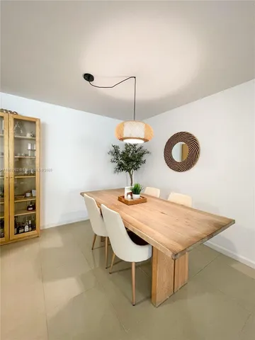 a table and chairs in a room