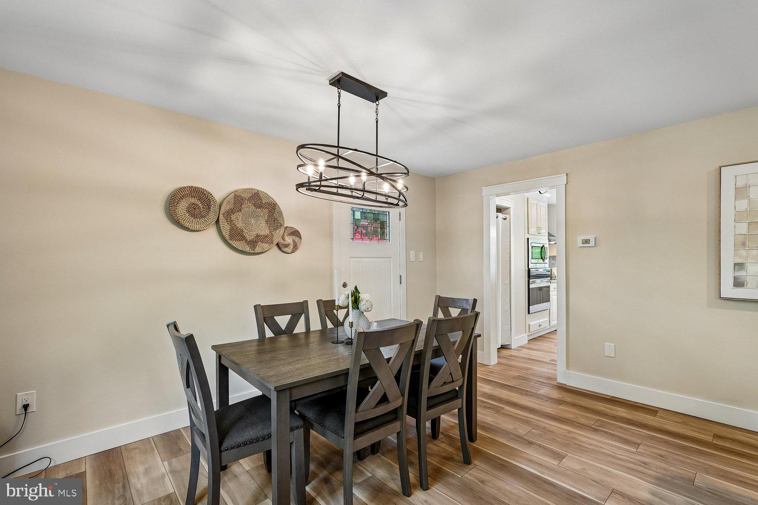 11110 Forest Edge Drive Reston, VA 20190 - Photo 14 of 46 Charming dining space with modern accents.