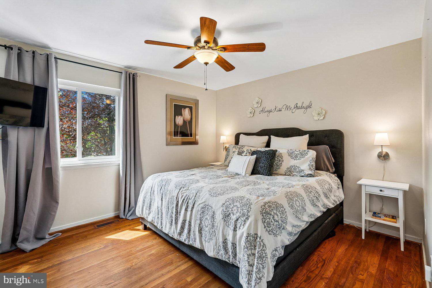 11110 Forest Edge Drive Reston, VA 20190 - Photo 17 of 46 Serene bedroom with natural light and charm.