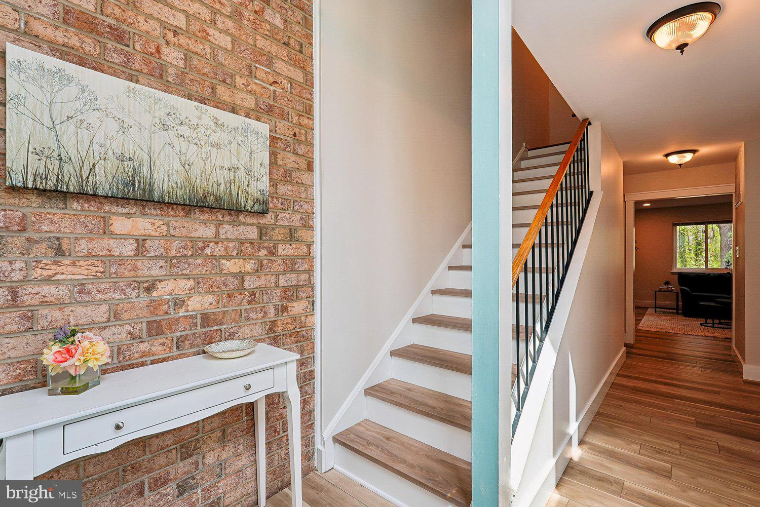 11110 Forest Edge Drive Reston, VA 20190 - Photo 18 of 46 Inviting entryway with warm brick accents.