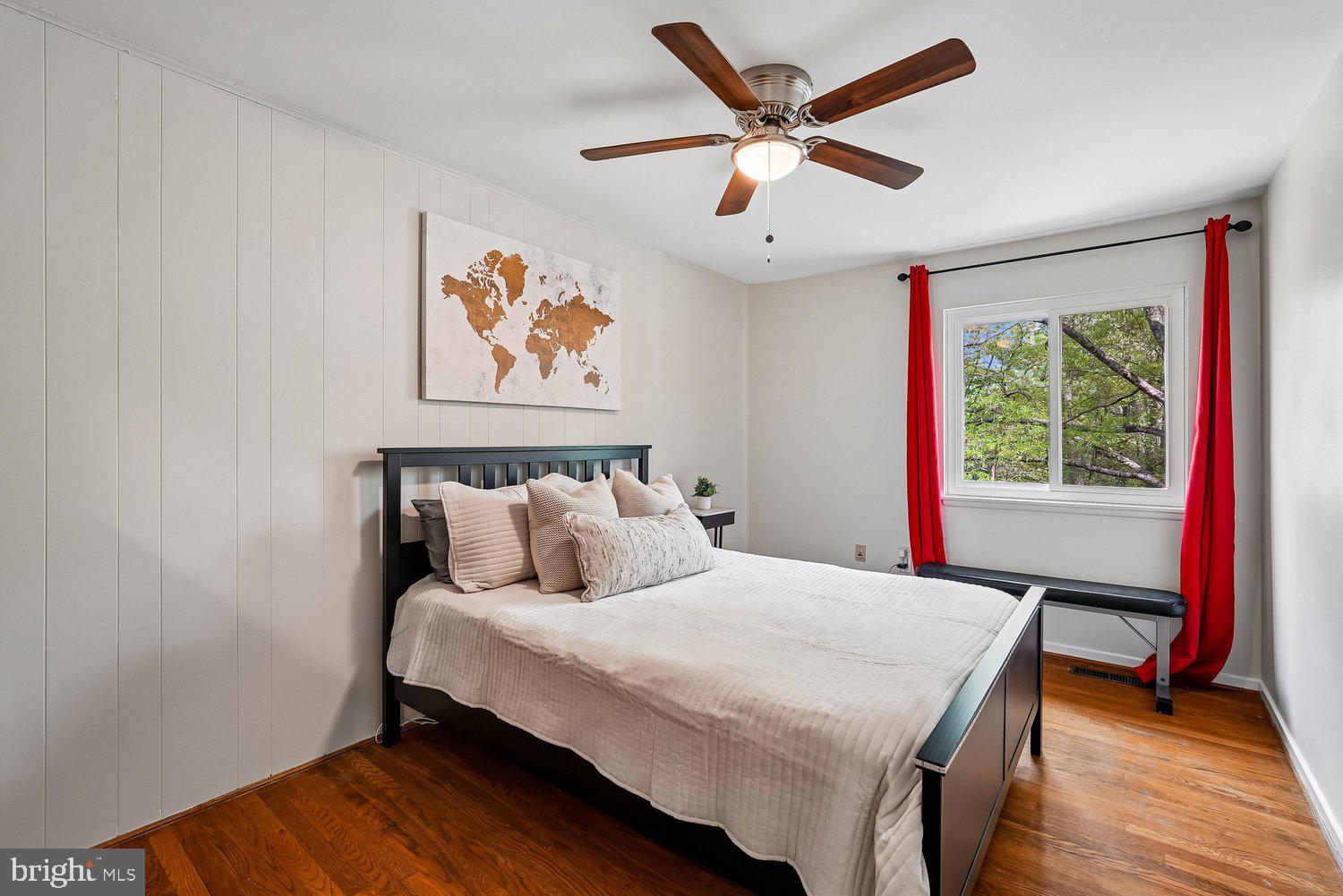 11110 Forest Edge Drive Reston, VA 20190 - Photo 22 of 46 Cozy bedroom with vibrant red accents.