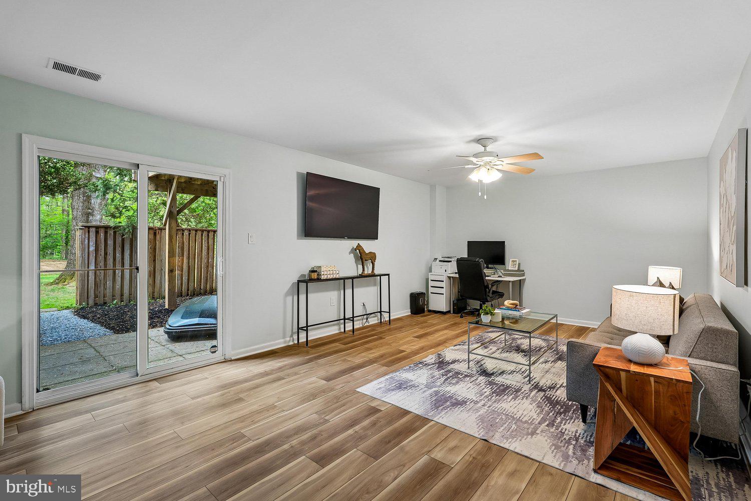 11110 Forest Edge Drive Reston, VA 20190 - Photo 29 of 46 Bright and airy space with outdoor access.