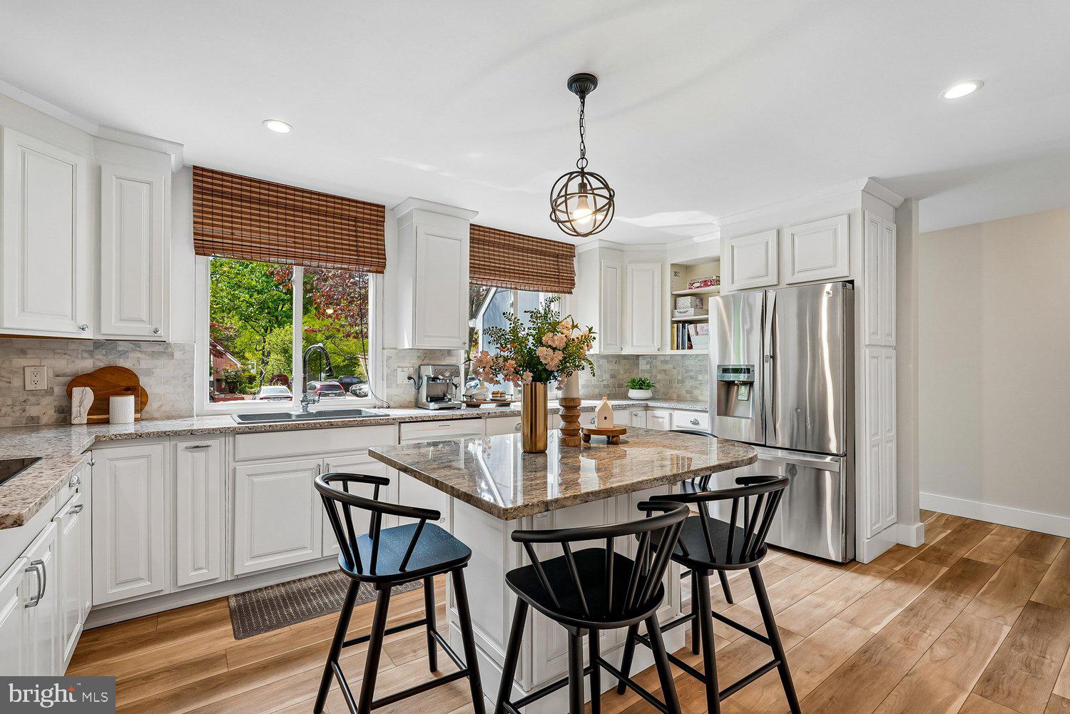 11110 Forest Edge Drive Reston, VA 20190 - Photo 5 of 46 Bright and airy kitchen with modern elegance.