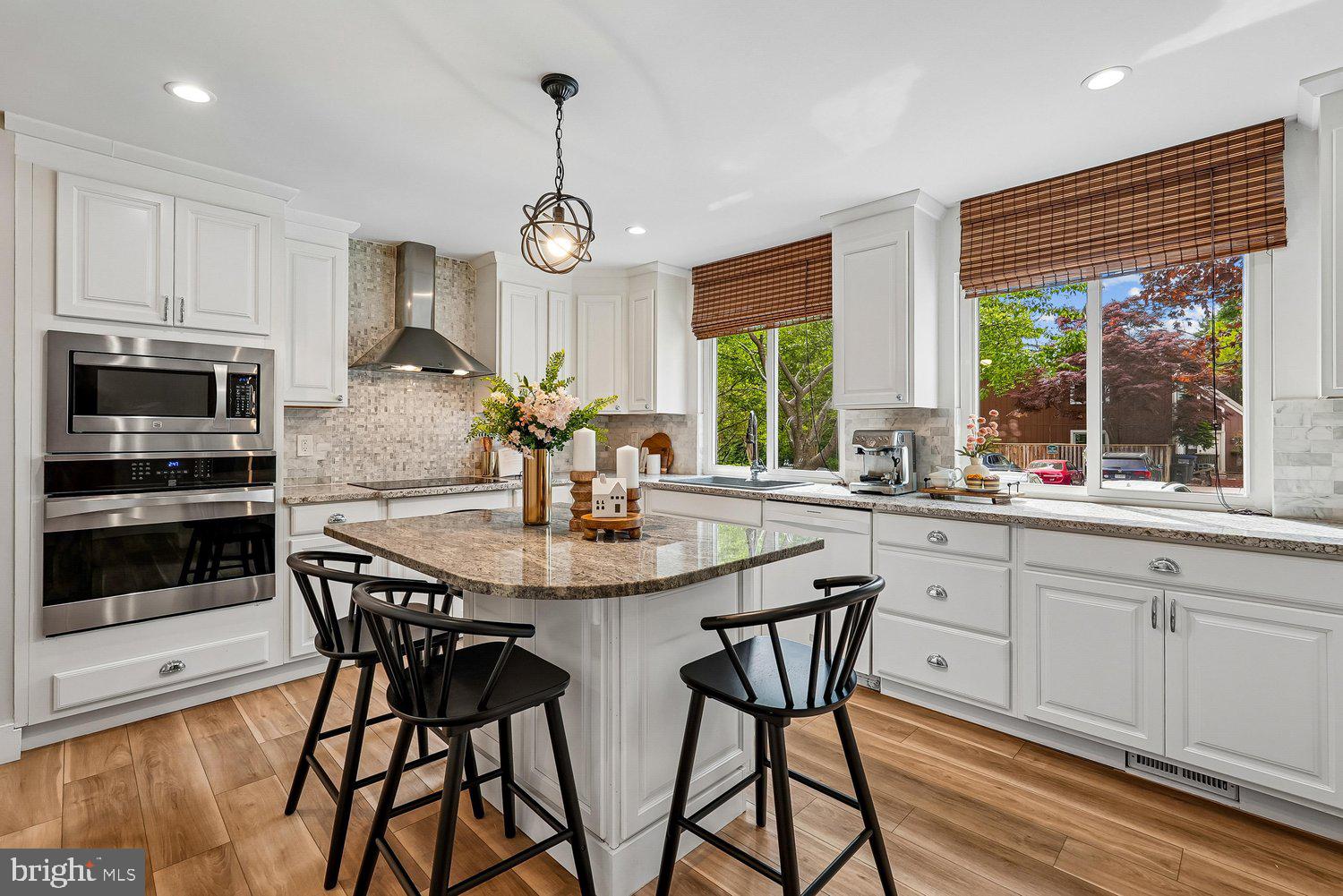 11110 Forest Edge Drive Reston, VA 20190 - Photo 6 of 46 Bright and airy kitchen with modern elegance.