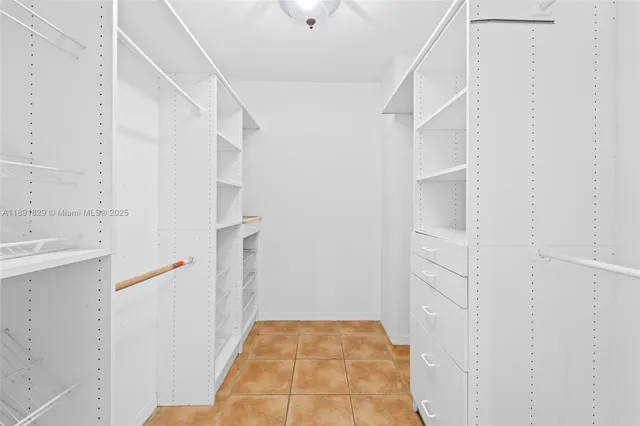 a bathroom with a sink and a shower