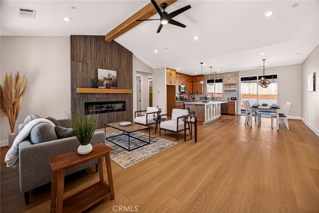 1528 Forest Paradise, CA 95969 - Photo 11 of 49 a living room with furniture and a fireplace