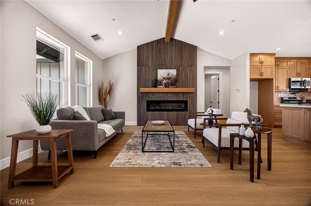 1528 Forest Paradise, CA 95969 - Photo 12 of 49 a living room with furniture and a fireplace