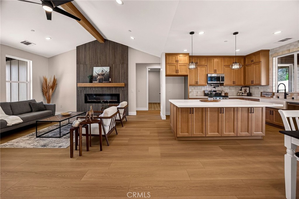 1528 Forest Paradise, CA 95969 - Photo 13 of 49 a large kitchen with a table and chairs