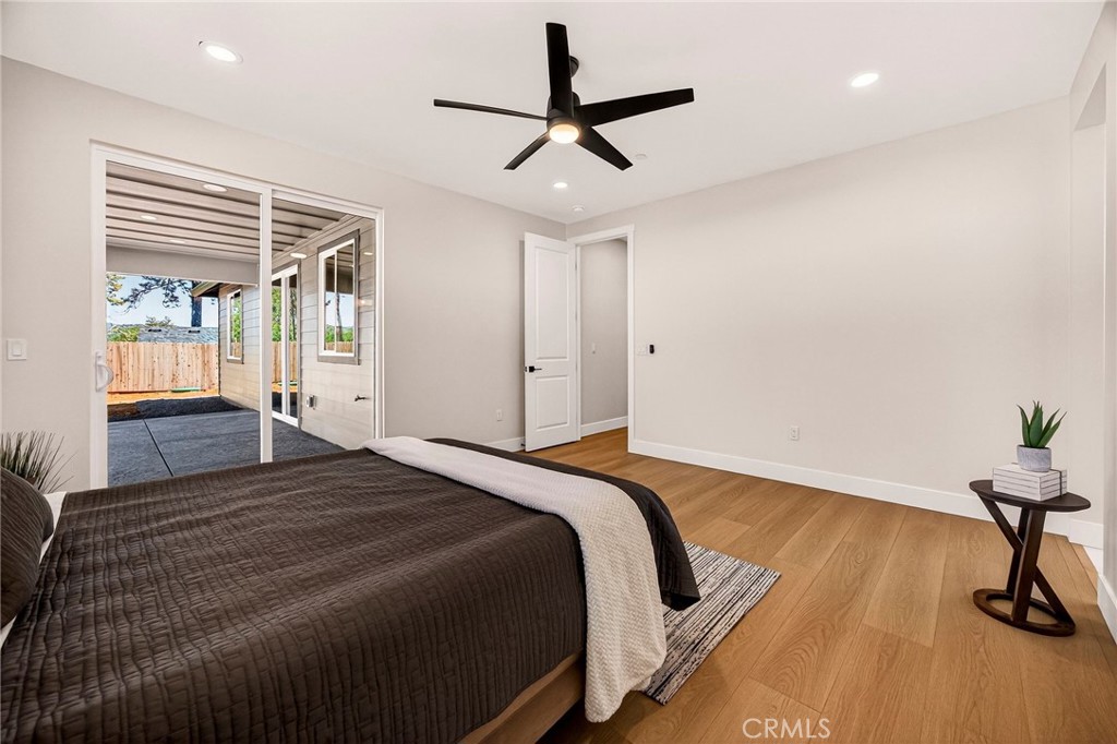 1528 Forest Paradise, CA 95969 - Photo 22 of 49 a bedroom with a bed and a dresser